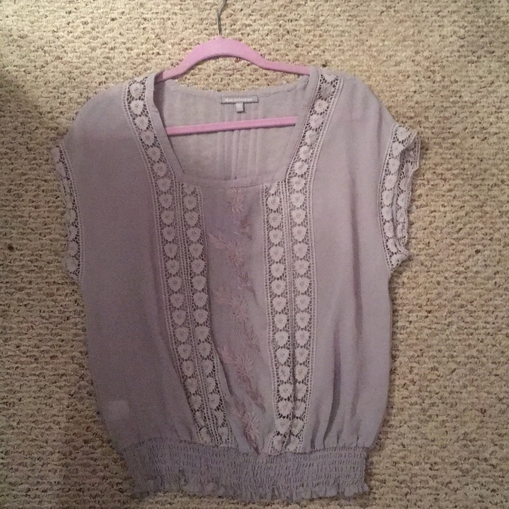 This is a grayish sleeve less top